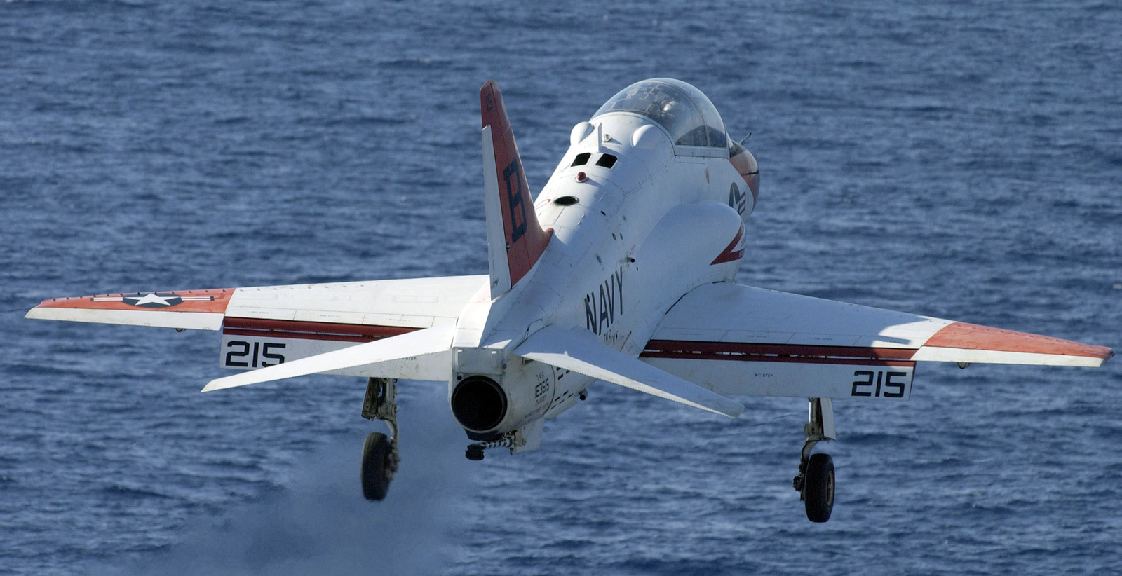a-us-navy-t-45-goshawk-trainer-jet-launches-from-the-flight-deck-of-the-nimitz-0be521-1600.jpg