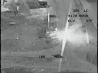 F-18-Takes-Out-Insurgents-White-Hot-Flare-Rotating.