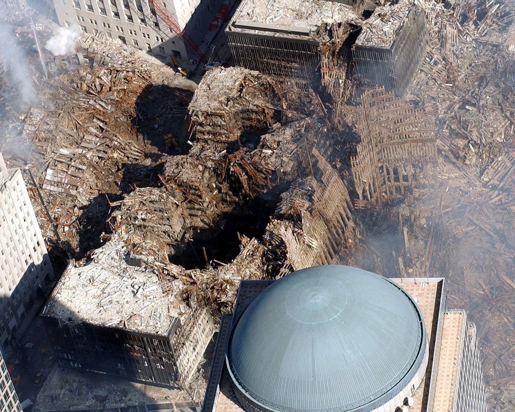www.drjudywood.com_articles_DEW_dewpics_911wtc6craterwestair.jpg