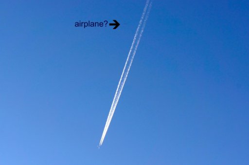 Jet with contrails.jpg