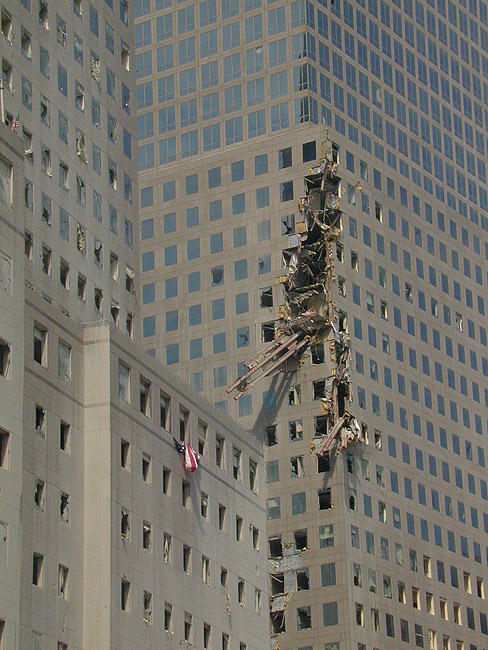 www.skeptic.com_eskeptic_2011_images_11_09_07_Beam_lodged_in_bldg_LG.jpg