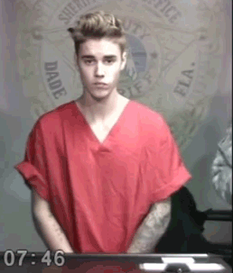JustinBieberincourtlooksdown.gif