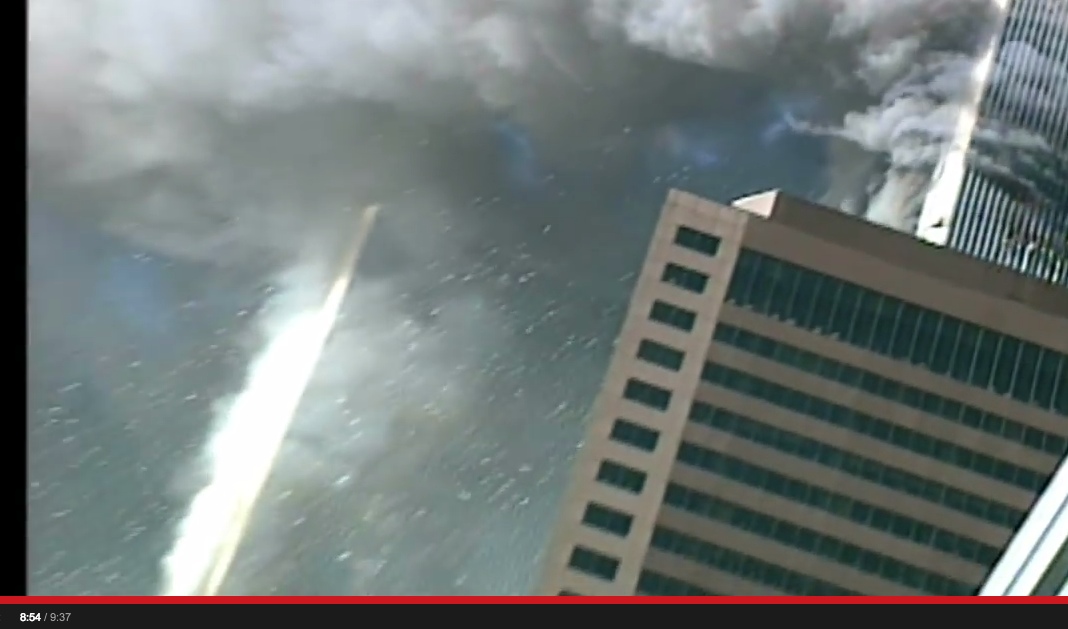 NIST_FOIA_Release_25__42A0119__G25D30_Video_2_WTC2_Impact_ExplosionWTC1_Smoke_Puffs__YouTube_20140313_121255_20140313_121257.jpg